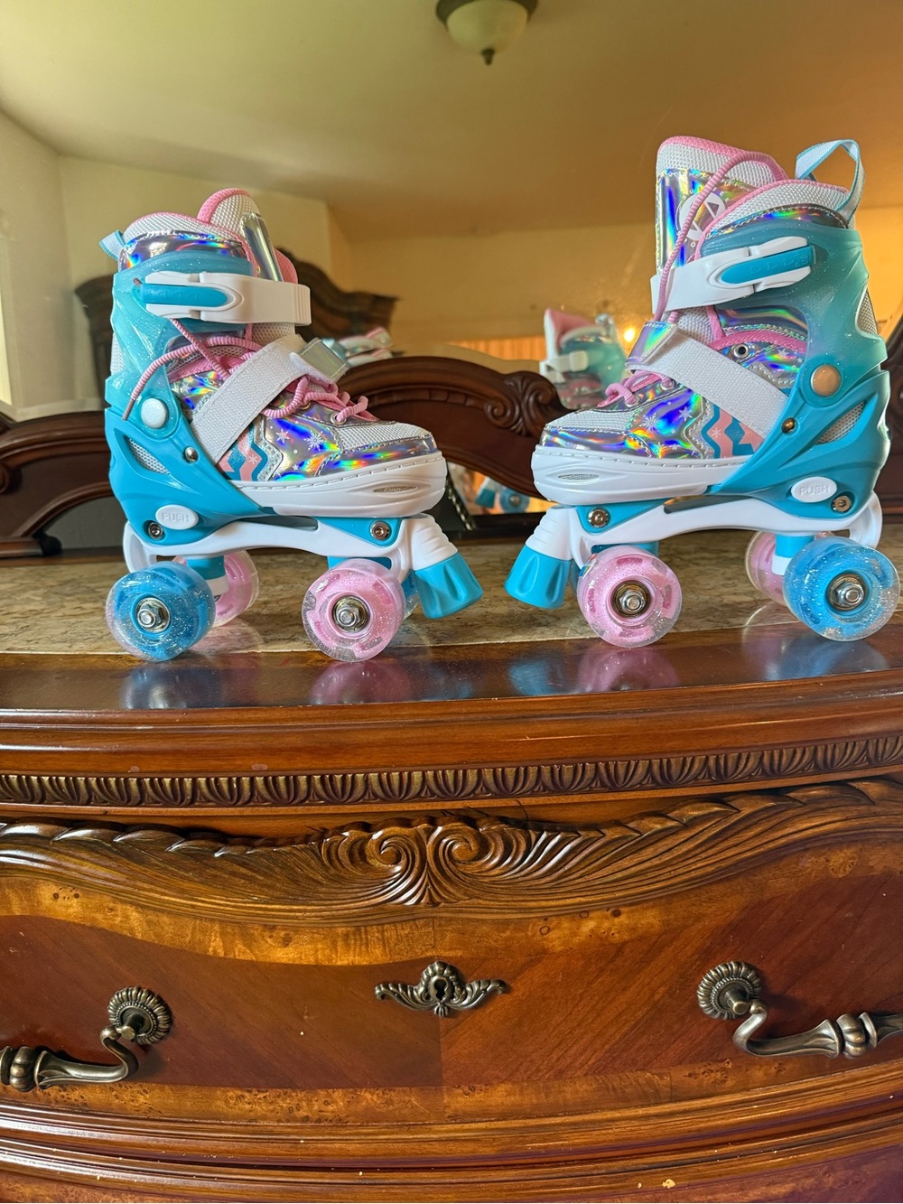 Adjustable Kids Quad Roller Skates in Turquoise and Pink